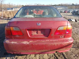 1999 Honda Civic LX with VIN 1HGEJ6579XL014663, listed as a IAAI auction lot 41250453 with 251,342 mi miles. Bid and sale history available at carsss.com. Image 6.