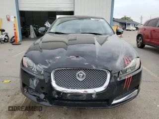 2013 Jaguar XF V6 SC with VIN SAJWJ0EF3D8S85693, listed as a Copart auction lot 75660304 with 70,565 mi miles and Salvage Title. Bid and sale history available at carsss.com. Image 5.