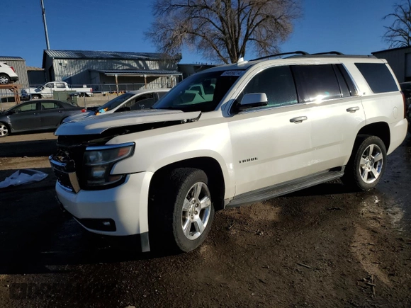 2015 Chevrolet Tahoe LT with VIN 1GNSCBKC2FR738042, listed as a Copart auction lot 84856214 with 144,325 mi miles and Salvage title. Bid and sale history available at DreamBid. Image 1.
