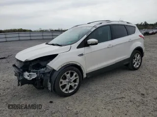 2016 Ford Escape Titanium with VIN 1FMCU9JX6GUB85980, listed as a Copart auction lot 51748715 with 129,537 mi miles and Salvage Title. Bid and sale history available at carsss.com. Image 1.