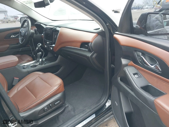 2018 Chevrolet Traverse High Country with VIN 1GNEVKKW0JJ101899, listed as a IAAI auction lot 41398396 with 107,055 mi miles. Bid and sale history available at carsss.com. Image 5.