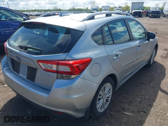 2018 Subaru Impreza Premium with VIN 4S3GTAD61J3715461, listed as a IAAI auction lot 42205386 with 39,933 mi miles and . Bid and sale history available at DreamBid. Image 4.