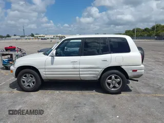 1999 Toyota RAV4 with VIN JT3GP10V5X7043735, listed as a IAAI auction lot 41939137 with 206,044 mi miles and . Bid and sale history available at DreamBid. Image 14.