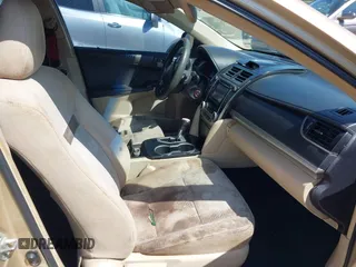 2012 Toyota Camry L with VIN 4T1BF1FKXCU030959, listed as a IAAI auction lot 42022501 with 304,524 mi miles. Bid and sale history available at carsss.com. Image 5.