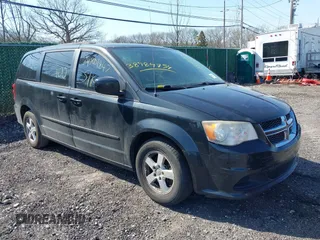 2013 Dodge Grand Caravan SXT with VIN 2C4RDGCG1DR626827, listed as a IAAI auction lot 38984754 with 224,487 mi miles and . Bid and sale history available at DreamBid. Image 1.