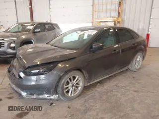 2015 Ford Focus SE with VIN 1FADP3F23FL216154, listed as a IAAI auction lot 42411857 with 127,612 mi miles and . Bid and sale history available at DreamBid. Image 2.