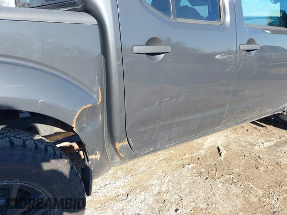 2015 Nissan Frontier Pro-4X with VIN 1N6AD0EV6FN708016, listed as a IAAI auction lot 41660814 with 86,676 mi miles and . Bid and sale history available at DreamBid. Image 19.