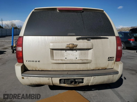 2009 Chevrolet Tahoe LTZ with VIN 1GNFK33059R217187, listed as a Copart auction lot 51563245 with 256,259 mi miles and Salvage title. Bid and sale history available at DreamBid. Image 6.
