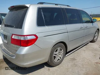 2005 Honda Odyssey EX-L z VIN 5FNRL38765B135803, wystawiony jako IAAI lot #42421288 z przebiegiem 185 043 mil mil oraz . Historia ofert i sprzedaży dostępna na DreamBid. Obrazek 4.
