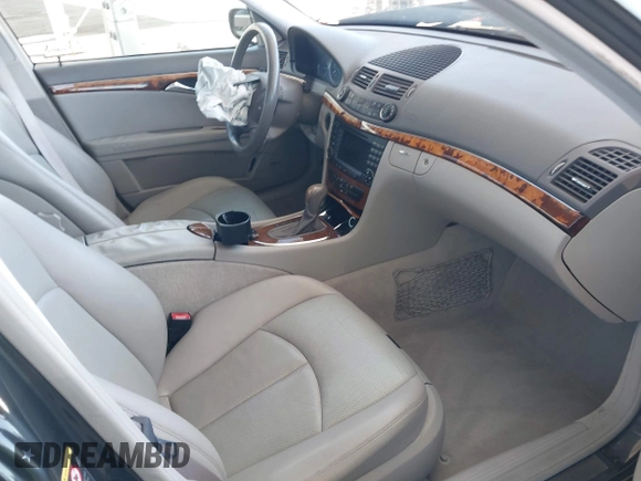 2004 Mercedes-Benz E 320 with VIN WDBUH65J94A404959, listed as a IAAI auction lot 41861247 with 223,466 mi miles and . Bid and sale history available at DreamBid. Image 5.