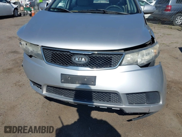 2010 Kia Forte EX with VIN KNAFU4A2XA5097831, listed as a IAAI auction lot 41872156 with 168,081 mi miles. Bid and sale history available at carsss.com. Image 18.