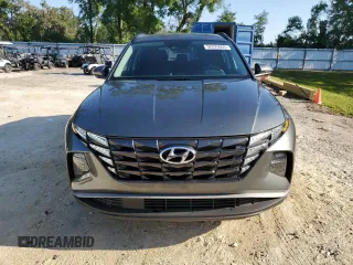 2022 Hyundai Tucson SEL with VIN 5NMJB3AE1NH121735, listed as a Copart auction lot 52225955 with 43,952 mi miles and Salvage Title. Bid and sale history available at carsss.com. Image 5.