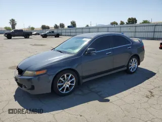 2006 Acura TSX with VIN JH4CL96826C019550, listed as a Copart auction lot 61312725 with 215,251 mi miles and Salvage title. Bid and sale history available at DreamBid. Image 1.