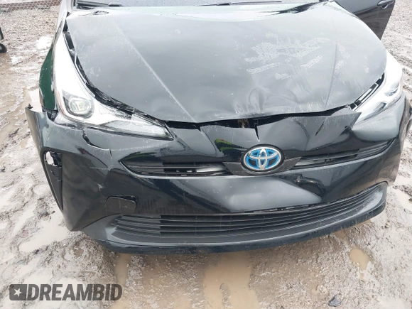 2021 Toyota Prius L Eco with VIN JTDKAMFU5M3145210, listed as a IAAI auction lot 41482234 with 85,600 mi miles and . Bid and sale history available at DreamBid. Image 6.
