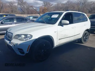 2012 BMW X5 35d with VIN 5UXZW0C56CL665631, listed as a IAAI auction lot 41055705 with 179,408 mi miles and . Bid and sale history available at DreamBid. Image 17.