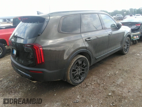 2021 Kia Telluride EX with VIN 5XYP3DHC1MG128114, listed as a IAAI auction lot 42699570 with 92,775 mi miles and . Bid and sale history available at DreamBid. Image 4.