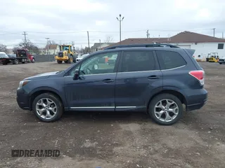 2017 Subaru Forester Touring with VIN JF2SJATC5HH518783, listed as a IAAI auction lot 41889172 with 115,801 mi miles and . Bid and sale history available at DreamBid. Image 13.