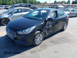 2022 Hyundai Accent SE with VIN 3KPC24A60NE181293, listed as a IAAI auction lot 42517919 with 14,896 mi miles and . Bid and sale history available at DreamBid. Image 2.