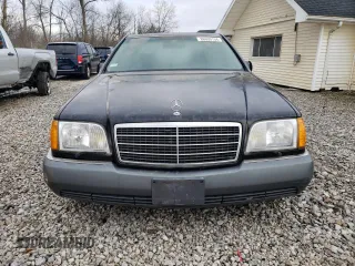1993 Mercedes-Benz 500 z VIN WDBGA51E7PA109156, wystawiony jako Copart lot #86609194 z przebiegiem 137 885 mil mil oraz Tytuł czysty. Historia ofert i sprzedaży dostępna na DreamBid. Obrazek 5.