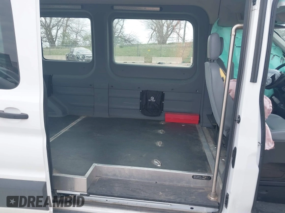 2019 Ford Transit with VIN 1FTYR2CM3KKA06742, listed as a IAAI auction lot 42062863 with 96,461 mi miles. Bid and sale history available at carsss.com. Image 8.