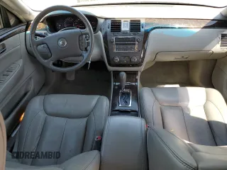2010 Cadillac DTS 1SA z VIN 1G6KA5EYXAU100721, wystawiony jako Copart lot #69624144 z przebiegiem 175 627 mil mil oraz Szkoda całkowita • Salvage title. Historia ofert i sprzedaży dostępna na DreamBid. Obrazek 8.