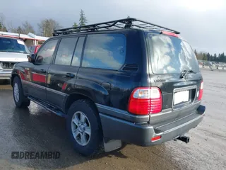 2001 Lexus LX 470 with VIN JTJHT00W613500563, listed as a IAAI auction lot 41730804 with 232,647 mi miles and . Bid and sale history available at carsss.com. Image 3.