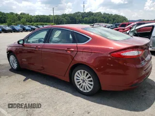 2014 Ford Fusion SE Hybrid with VIN 3FA6P0LU3ER253735, listed as a Copart auction lot 63222635 with 147,470 mi miles and Salvage title. Bid and sale history available at DreamBid. Image 2.