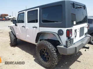 2013 Jeep Wrangler Unlimited Sport with VIN 1C4BJWDGXDL694054, listed as a IAAI auction lot 42097708 with 130,360 mi miles and . Bid and sale history available at DreamBid. Image 3.