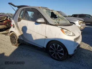 2010 Smart fortwo Pure с VIN WMEEJ3BA4AK363015, выставлен на аукционе Copart как лот 76066204 с пробегом Не указан миль и Списание • Salvage title. История ставок и продаж доступна на DreamBid. Изображение 4.