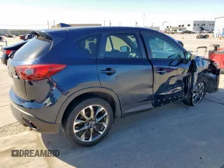 2016 Mazda CX-5 Grand Touring with VIN JM3KE2DY6G0668313, listed as a Copart auction lot 48353535 with 70,085 mi miles and Salvage Title. Bid and sale history available at carsss.com. Image 3.