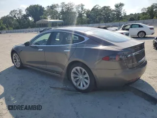 2017 Tesla Model S 100D z VIN 5YJSA1E2XHF173740, wystawiony jako Copart lot #62233125 z przebiegiem 73 932 mil mil oraz Szkoda całkowita • Salvage title. Historia ofert i sprzedaży dostępna na DreamBid. Obrazek 2.