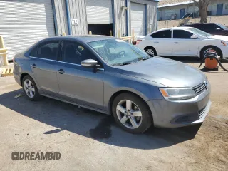 2014 Volkswagen Jetta TDI w/Premium with VIN 3VWLL7AJXEM398033, listed as a Copart auction lot 53503325 with 96,081 mi miles and Salvage title. Bid and sale history available at DreamBid. Image 4.