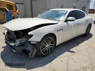 2019 Maserati Ghibli z VIN ZAM57XSAXK1310133, wystawiony jako Copart lot #63601294 z przebiegiem 53 081 mil mil oraz Szkody całkowita. Historia ofert i sprzedaży dostępna na DreamBid. Obrazek 1.
