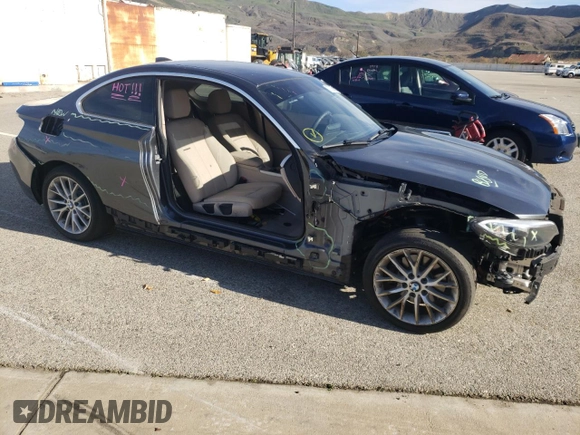 2015 BMW 2 Series 228i with VIN WBA1F5C50FV256459, listed as a Copart auction lot 56518723 with 65,653 mi miles. Bid and sale history available at carsss.com. Image 4.