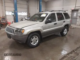 2004 Jeep Grand Cherokee Laredo with VIN 1J4GW48S44C321869, listed as a IAAI auction lot 41822099 with 181,663 mi miles. Bid and sale history available at carsss.com. Image 17.