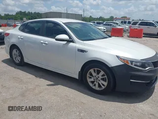 2016 Kia Optima LX z VIN KNAGT4L32G5094380, wystawiony jako IAAI lot #42233181 z przebiegiem 92 133 mil mil oraz . Historia ofert i sprzedaży dostępna na DreamBid. Obrazek 1.