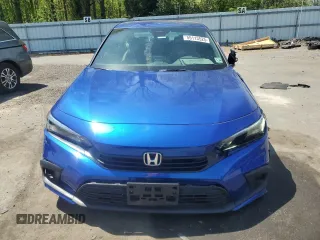 2023 Honda Civic Sport with VIN 2HGFE2F59PH528329, listed as a Copart auction lot 55113525 with 35,713 mi miles and Salvage title. Bid and sale history available at DreamBid. Image 5.