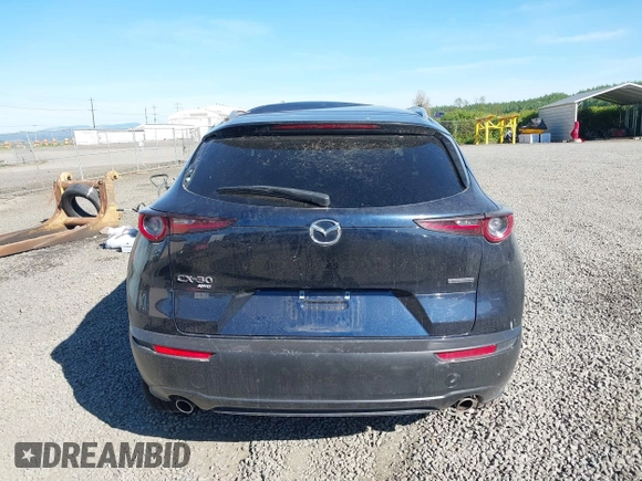 2023 Mazda CX-30 S Premium с VIN 3MVDMBDM7PM519793, выставлен на аукционе IAAI как лот 42184088 с пробегом 48 844 миль миль и . История ставок и продаж доступна на DreamBid. Изображение 16.