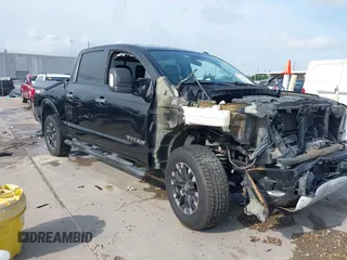 2017 Nissan Titan SV with VIN 1N6AA1E57HN561237, listed as a IAAI auction lot 42343906 with Not provided miles and . Bid and sale history available at DreamBid. Image 1.