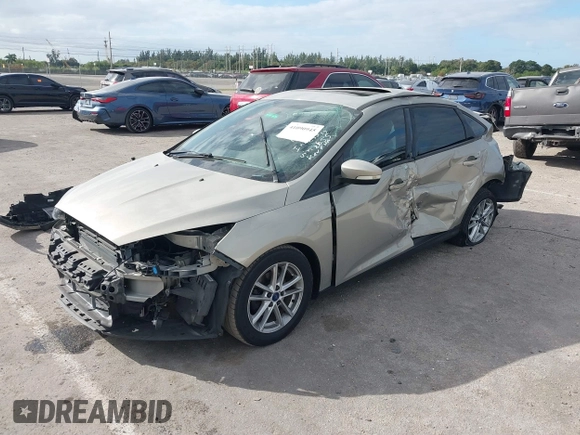 2015 Ford Focus SE with VIN 1FADP3F29FL292655, listed as a IAAI auction lot 41090945 with 106,060 mi miles. Bid and sale history available at carsss.com. Image 2.