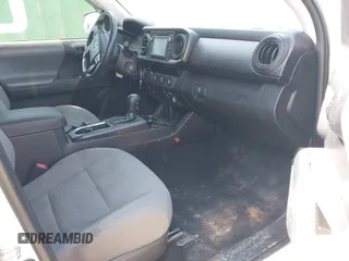 2017 Toyota Tacoma SR z VIN 5TFRX5GN9HX093461, wystawiony jako IAAI lot #41892559 z przebiegiem 159 986 mil mil oraz . Historia ofert i sprzedaży dostępna na DreamBid. Obrazek 5.