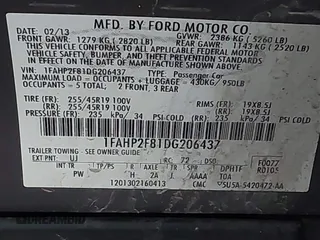 2013 Ford Taurus Limited with VIN 1FAHP2F81DG206437, listed as a IAAI auction lot 41942116 with 194,336 mi miles. Bid and sale history available at carsss.com. Image 9.