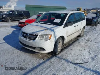 2014 Dodge Grand Caravan American Value with VIN 2C4RDGBG7ER422178, listed as a IAAI auction lot 41352312 with 176,415 mi miles and . Bid and sale history available at DreamBid. Image 2.