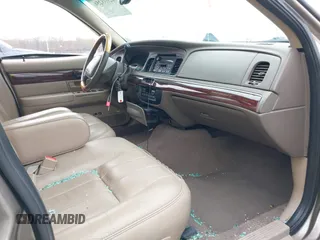 2003 Mercury Grand Marquis LS Premium z VIN 2MEFM75W73X653224, wystawiony jako IAAI lot #42038256 z przebiegiem 145 374 mil mil oraz . Historia ofert i sprzedaży dostępna na DreamBid. Obrazek 5.