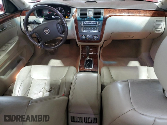 2007 Cadillac DTS Luxury I z VIN 1G6KD57Y97U160132, wystawiony jako Copart lot #60872185 z przebiegiem 135 440 mil mil oraz Szkoda całkowita • Salvage title. Historia ofert i sprzedaży dostępna na DreamBid. Obrazek 8.