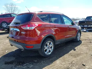 2016 Ford Escape Titanium with VIN 1FMCU0JX6GUC37684, listed as a IAAI auction lot 41829191 with 88,032 mi miles. Bid and sale history available at carsss.com. Image 4.