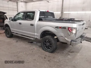 2015 Ford F-150 XLT with VIN 1FTEW1E89FFA44710, listed as a IAAI auction lot 41521584 with 158,297 mi miles. Bid and sale history available at carsss.com. Image 3.