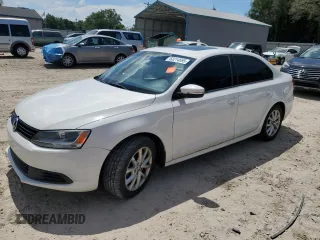 2012 Volkswagen Jetta SE z VIN 3VWDX7AJ5CM361641, wystawiony jako Copart lot #63214695 z przebiegiem 82 163 mil mil oraz Szkoda całkowita • Salvage title. Historia ofert i sprzedaży dostępna na DreamBid. Obrazek 1.