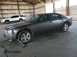 2009 Dodge Charger with VIN 2B3LK33V79H540374, listed as a Copart auction lot 64123635 with 155,823 mi miles and Salvage title. Bid and sale history available at DreamBid. Image 1.