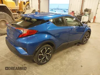 2019 Toyota C-HR XLE with VIN JTNKHMBX0K1042342, listed as a IAAI auction lot 41935879 with 54,190 mi miles and . Bid and sale history available at DreamBid. Image 4.